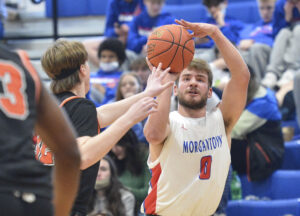 Alec Poland scores 23 points as Morgantown boys hoops beat Martinsburg